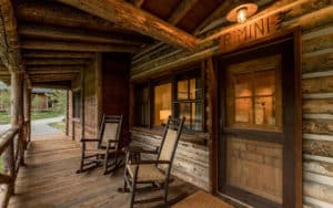 Rocking chairs on front porch of the Rimini Cabin at Mountain Sky Guest Ranch
