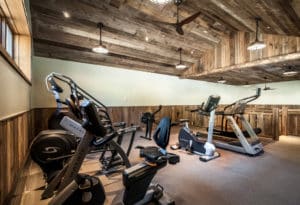 Treadmills, stair-steppers, and other cardio equipment at Mountain Sky Guest Ranch's fitness center