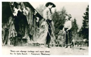 Black and white photo of Rancher and boy at Ox Yoke Ranch