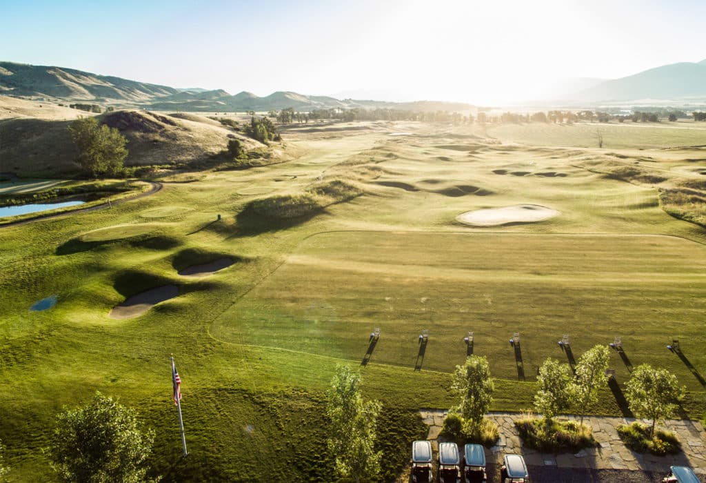 Driving range and course at Rising Sun Golf Course at Mountain Sky Guest Ranch