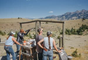 Group practicing their shot at Mountain Sky's clay shooting range