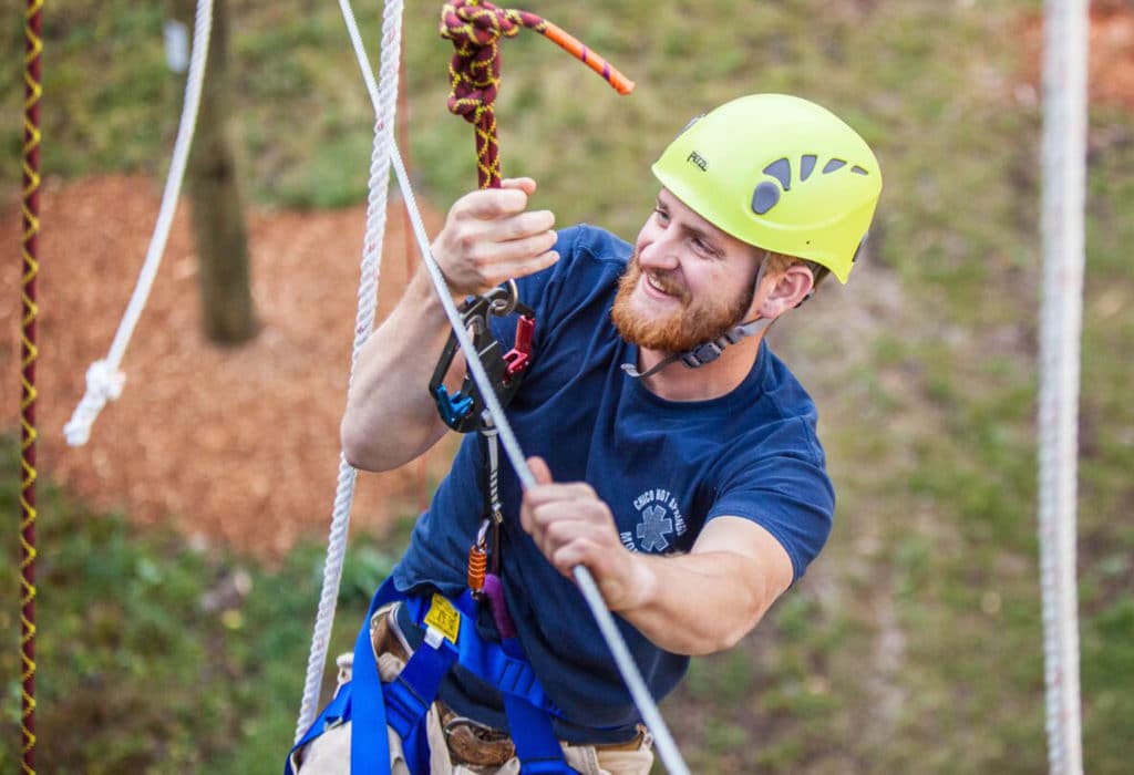Man smiling on Mountain Sky Guest Ranch challenge course