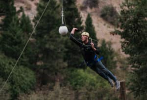 Man jumping for target on the Mountain Sky challenge course