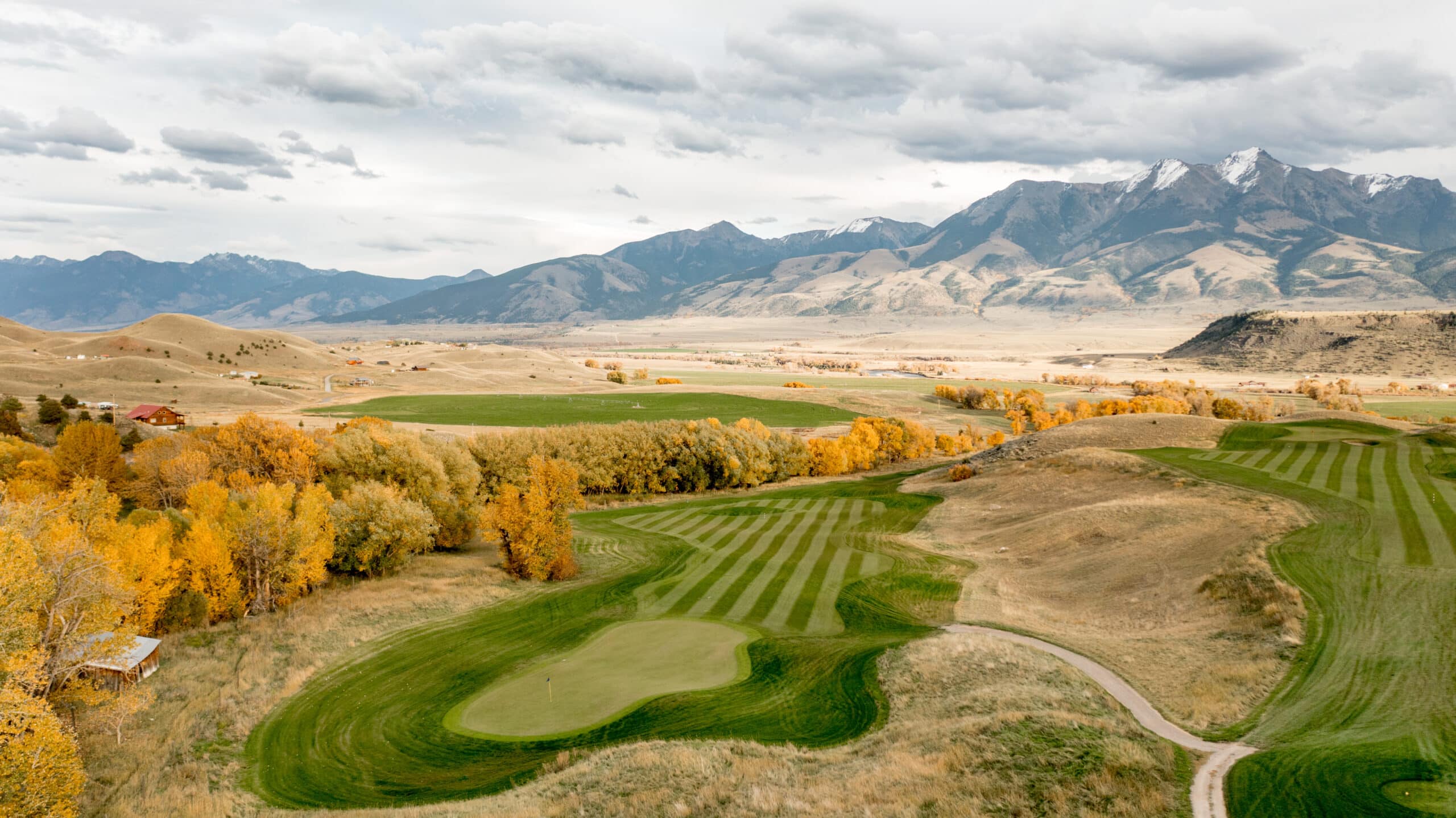 Rising un old course at Mountain Sky Guest Ranch provides amazing gold and breathtaking views.